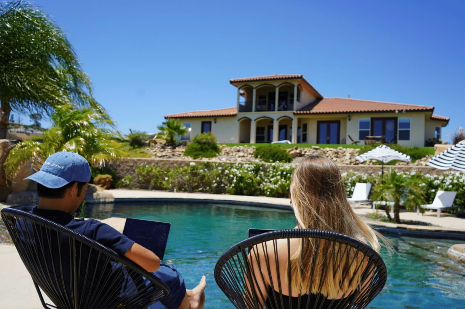 two people working remotely on their workcation