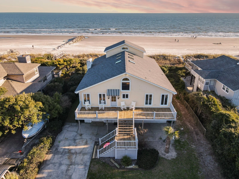 beachfront bungalow rest house on upper deck with staircase