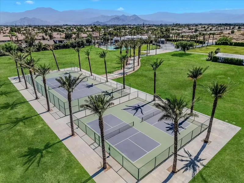 eagle view of 2 private courts in a mansion estate for tennis court and pickleball