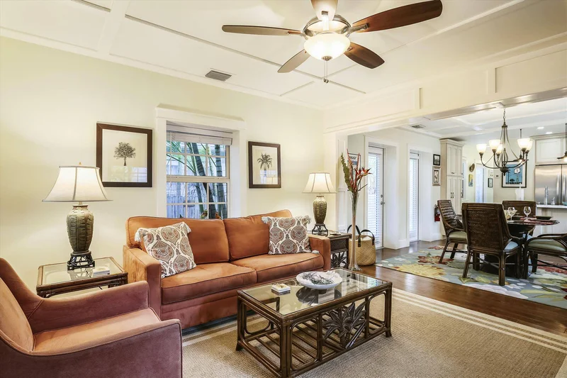 bright living room with cozy orange sofa and coffee table