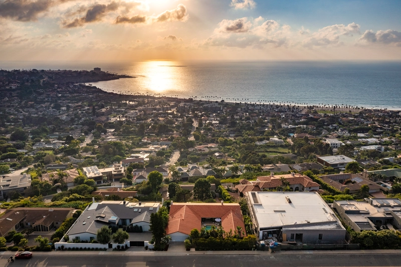 new sunrise on the big blue beach shoreline