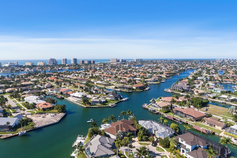 private separate secluded islands with mansions connected to the beach