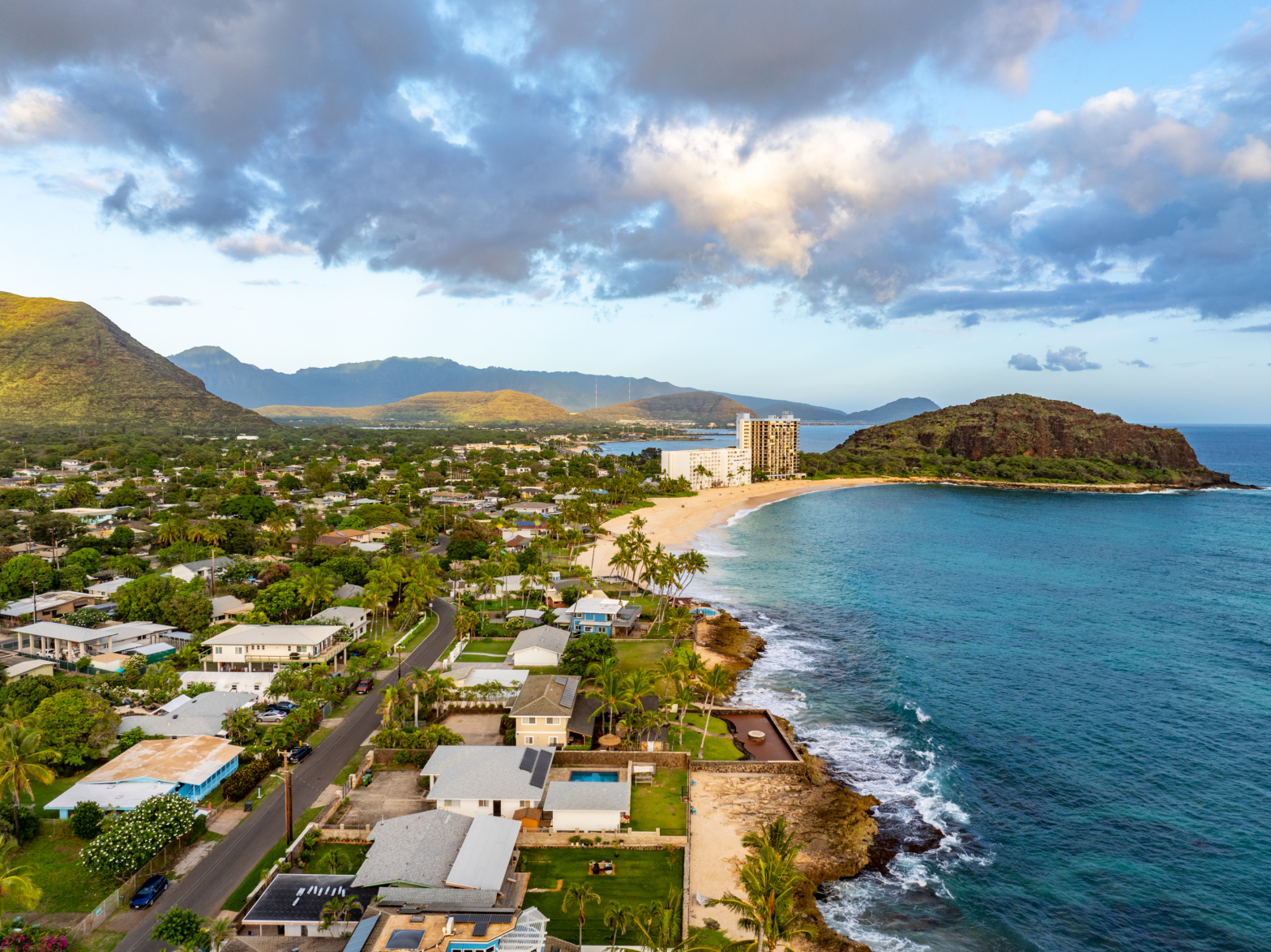 eagles eye shot of the island coast of hawaii and its mountains